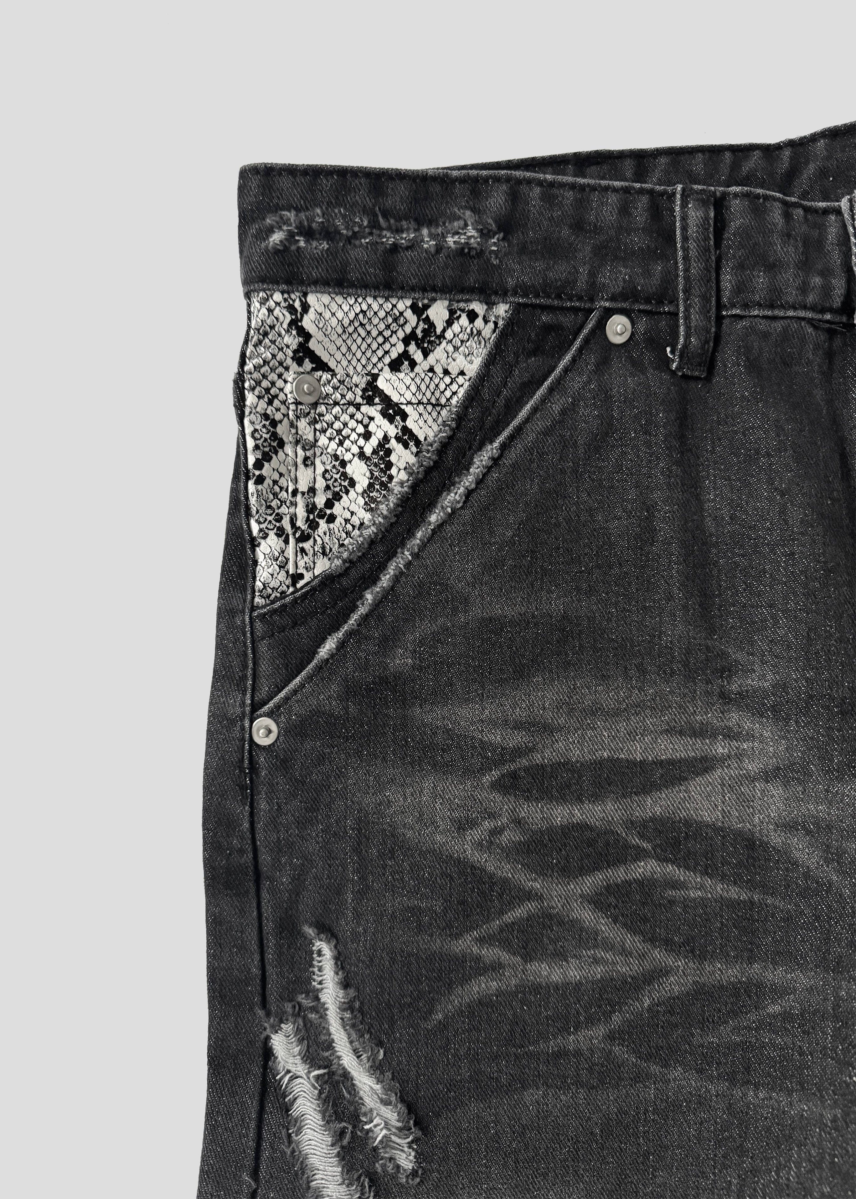 RISEBEYOND SNAKE JEANS