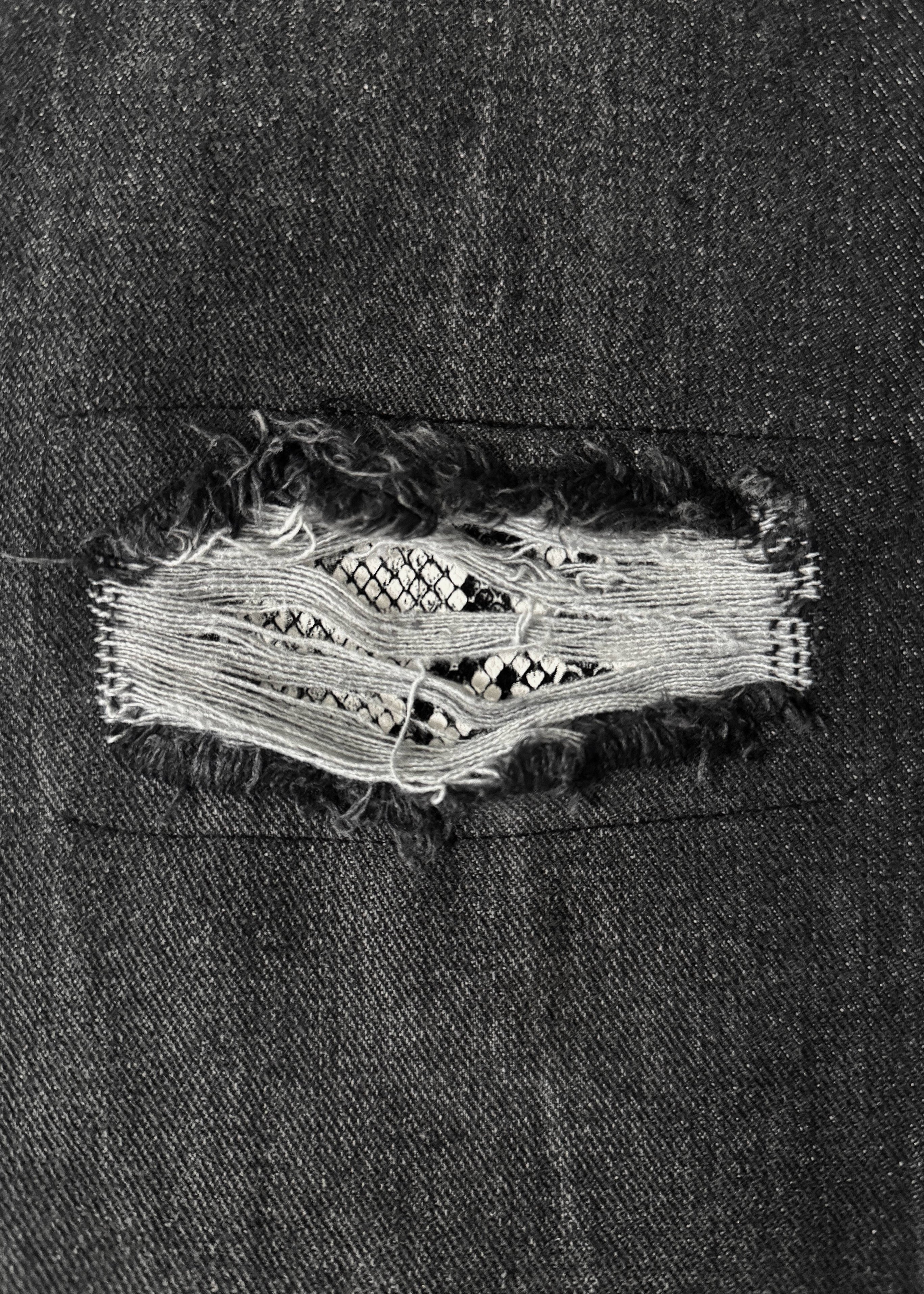 RISEBEYOND SNAKE JEANS