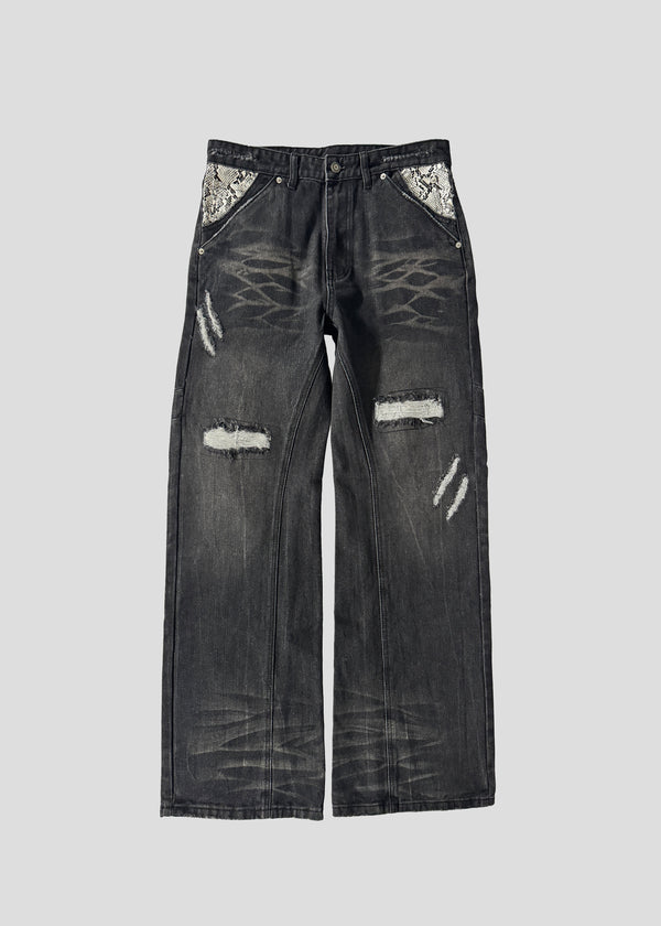 ONEFATE Snake Jeans in black washed denim, front view, with snake-pattern pocket panels and distressed rips