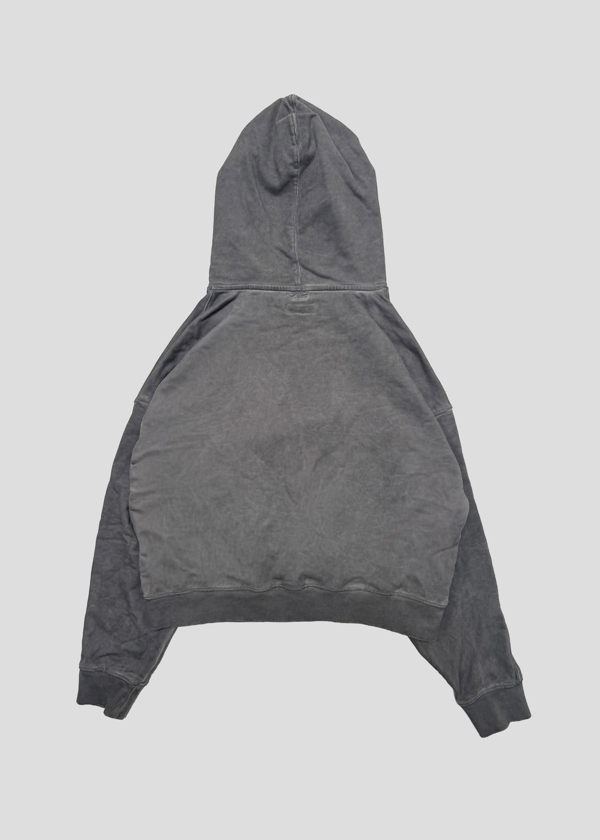 ONEFATE Dyed Hoodie in grey, back view, with a small neck label below the hood